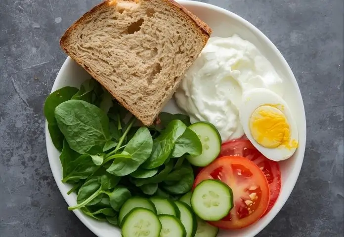 Step-by-step infographic showing making a high protein sandwich with icons for ingredients and assembly stages
